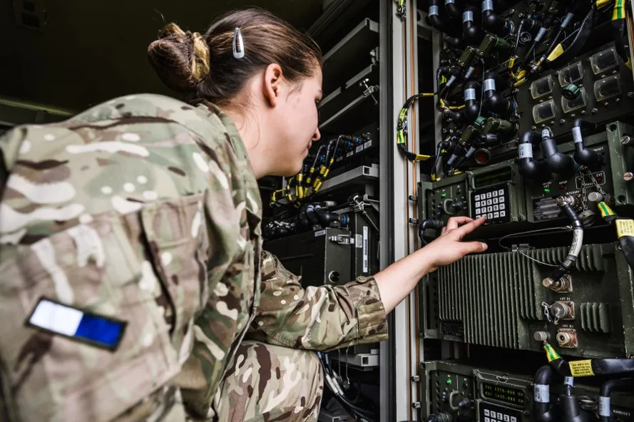 A soldier operating a land defence system.