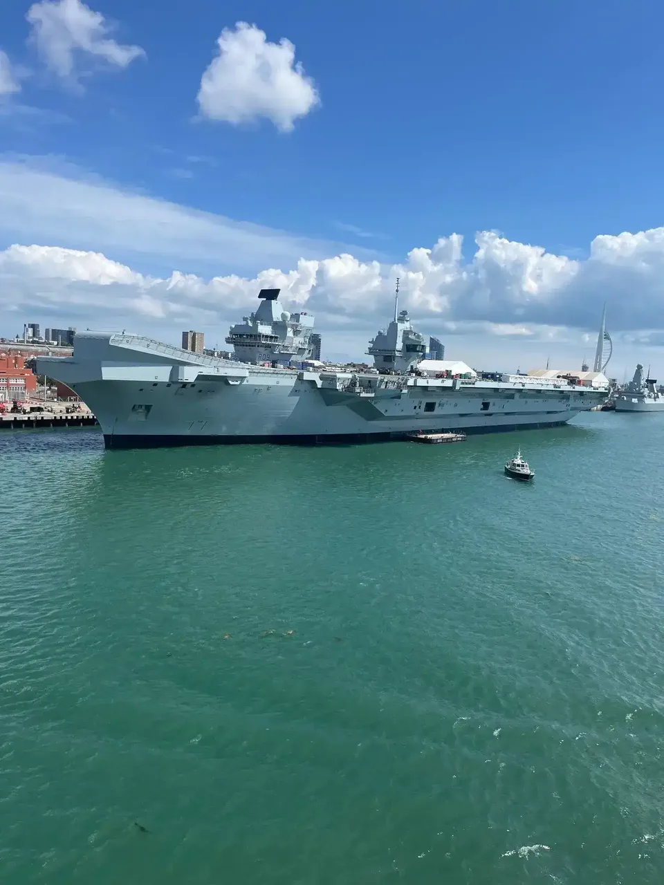 A large military ship docked in Portsmouth.